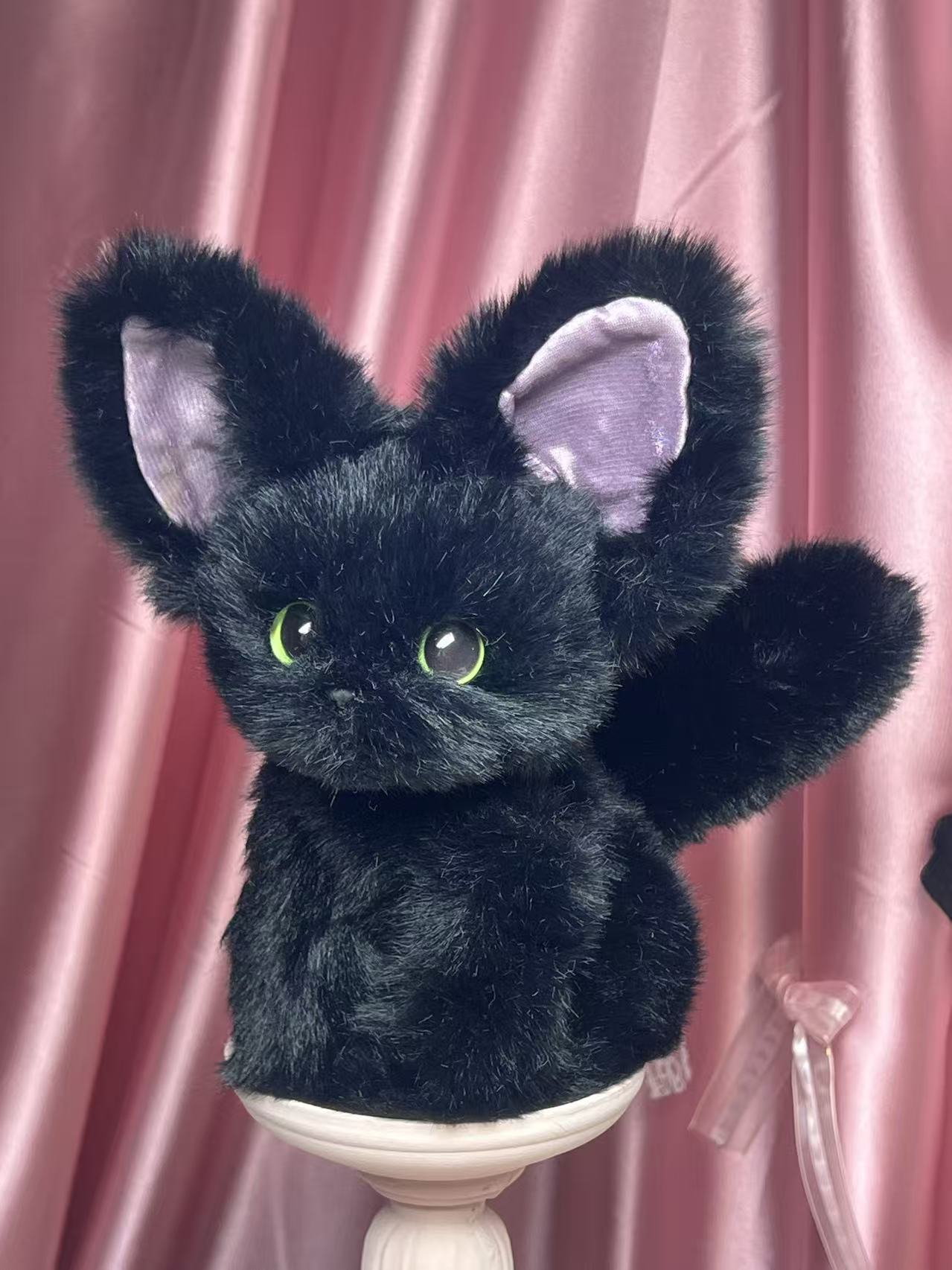 The Whsiper Bombay Cat