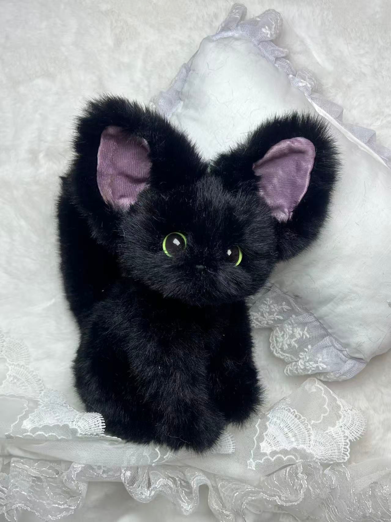 The Whsiper Bombay Cat