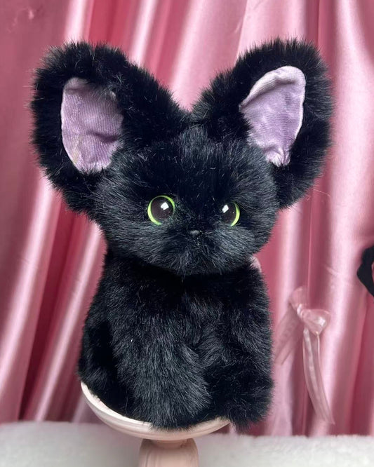 The Whsiper Bombay Cat