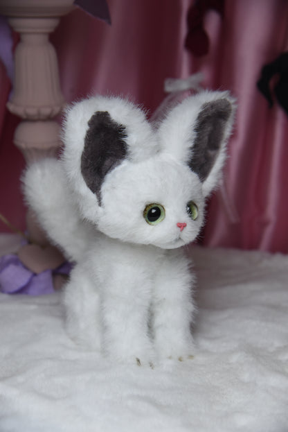 The Whisper Cloud Cat